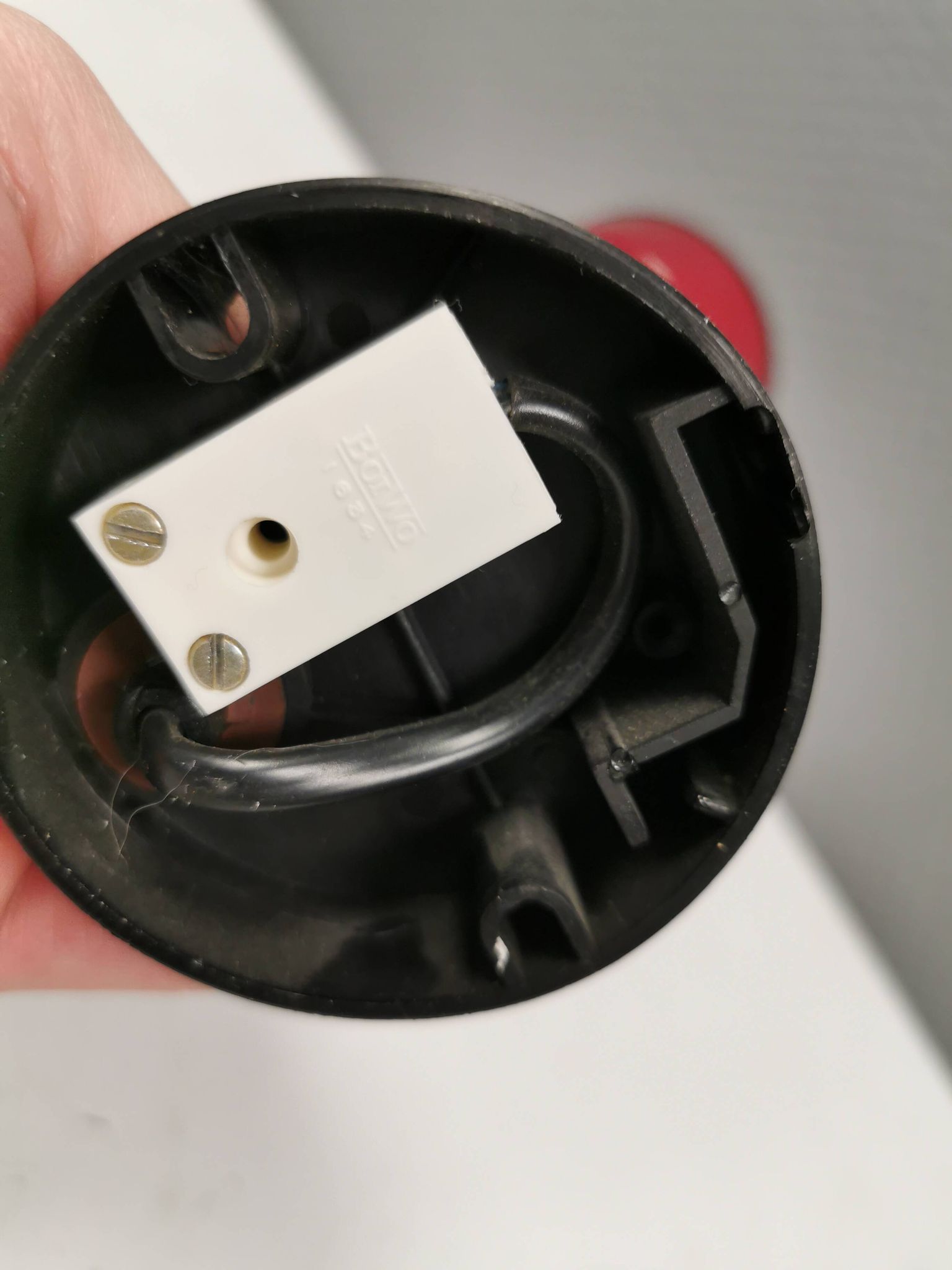 Small vintage wall lamp in hard pressed black and red plastic