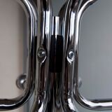 Chrome metal parrot coat holder from the 70s