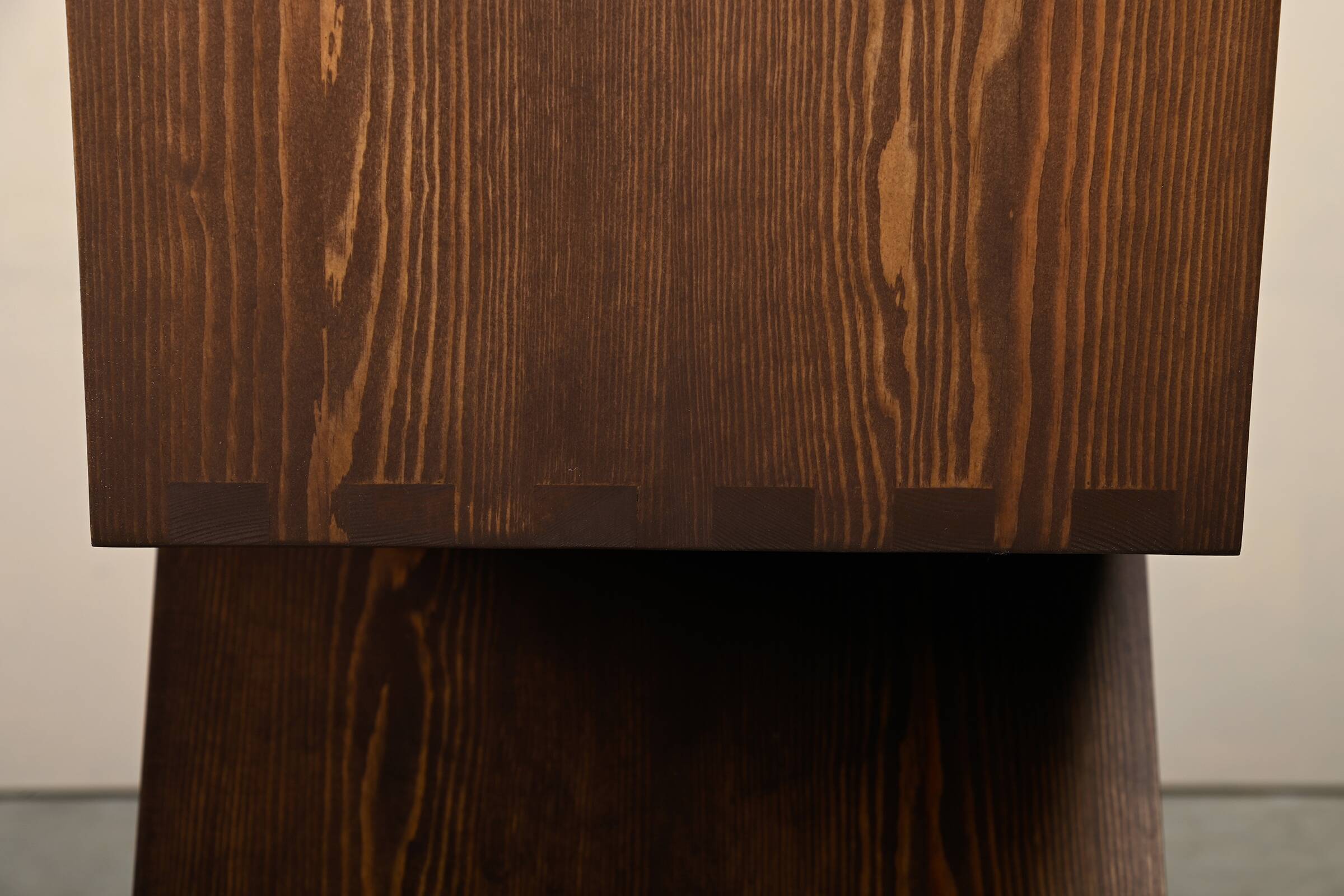 Gerrit Rietveld Zig Zag Chair is dark brown stained wood