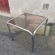 Table basse vintage chrome et verre fumé marron