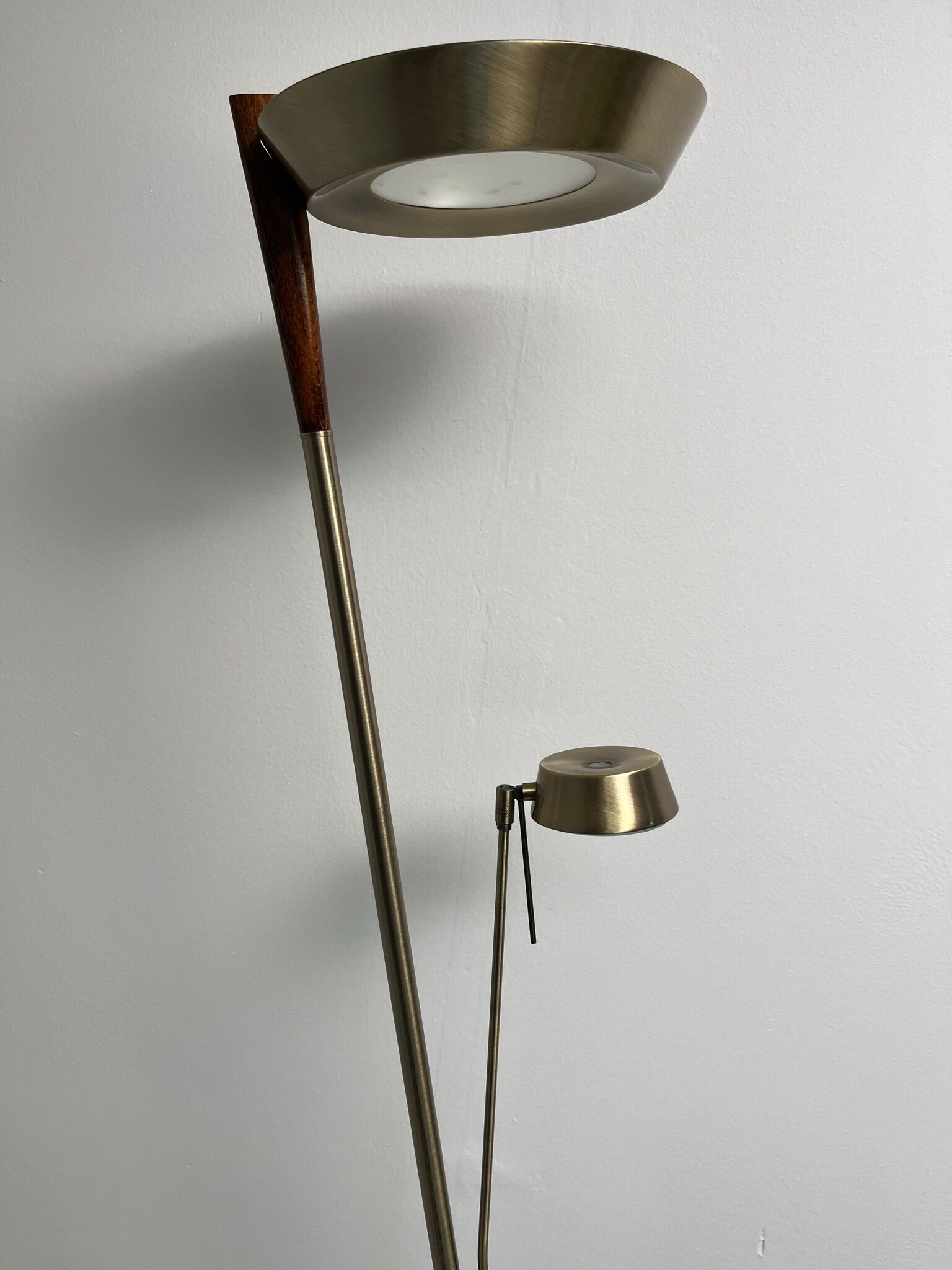 Golden metal floor lamp with reading light