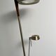 Golden metal floor lamp with reading light