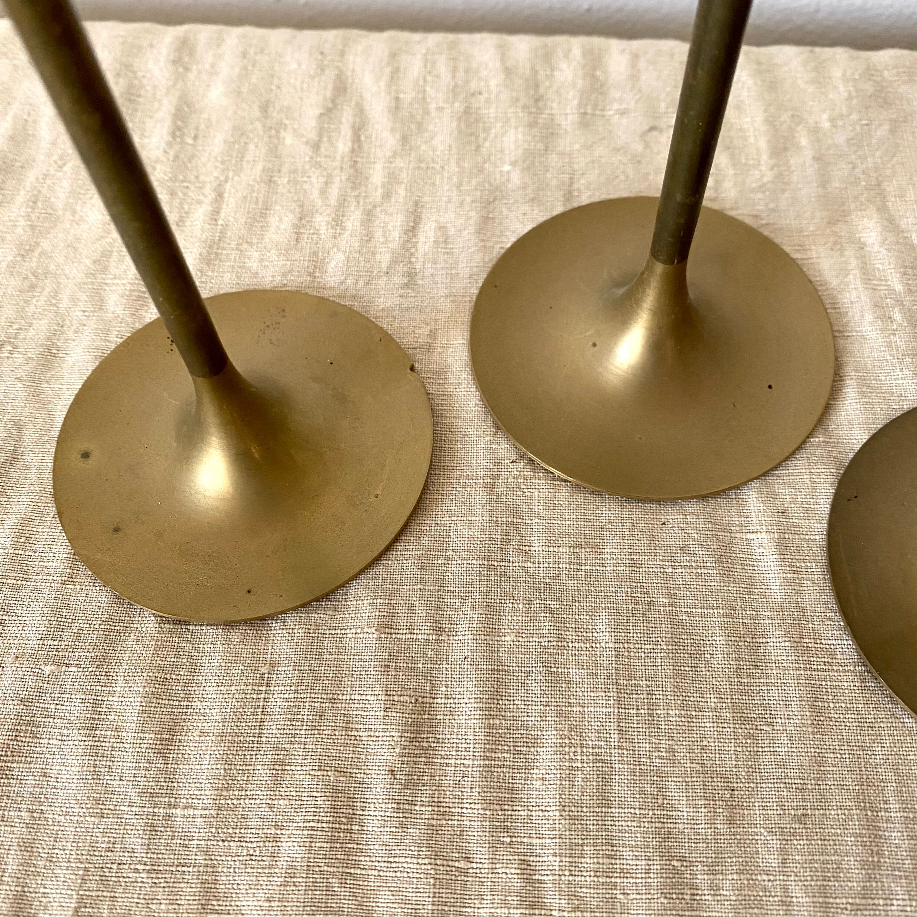 Series of brass candle holders