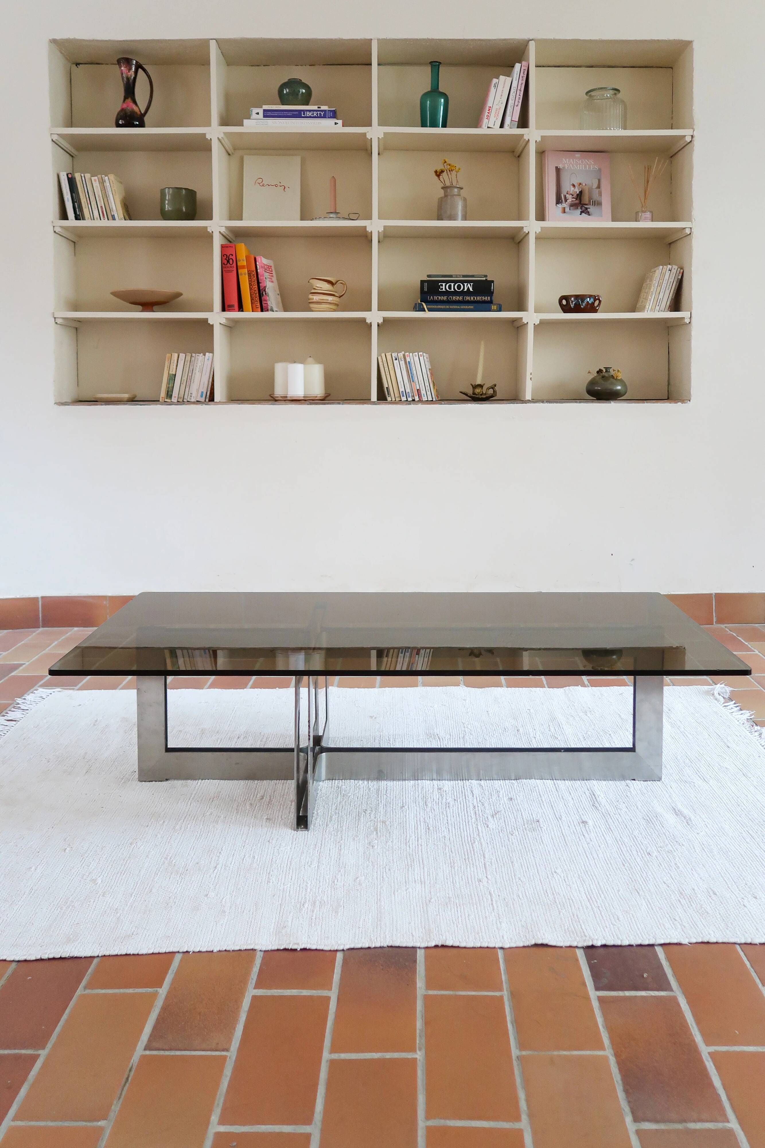 Smoked glass coffee table, brushed stainless steel base, 1970s.