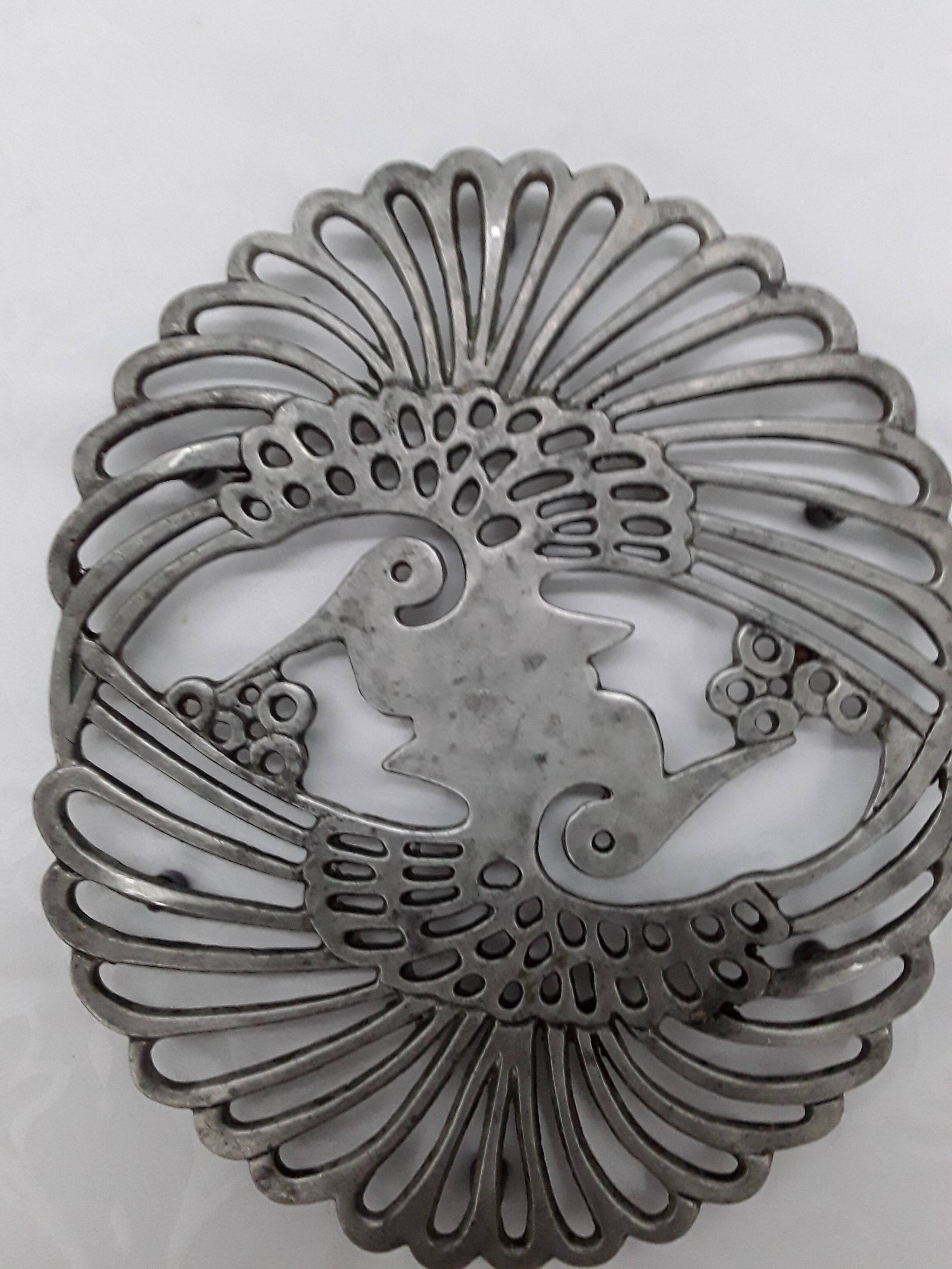 pewter trivet