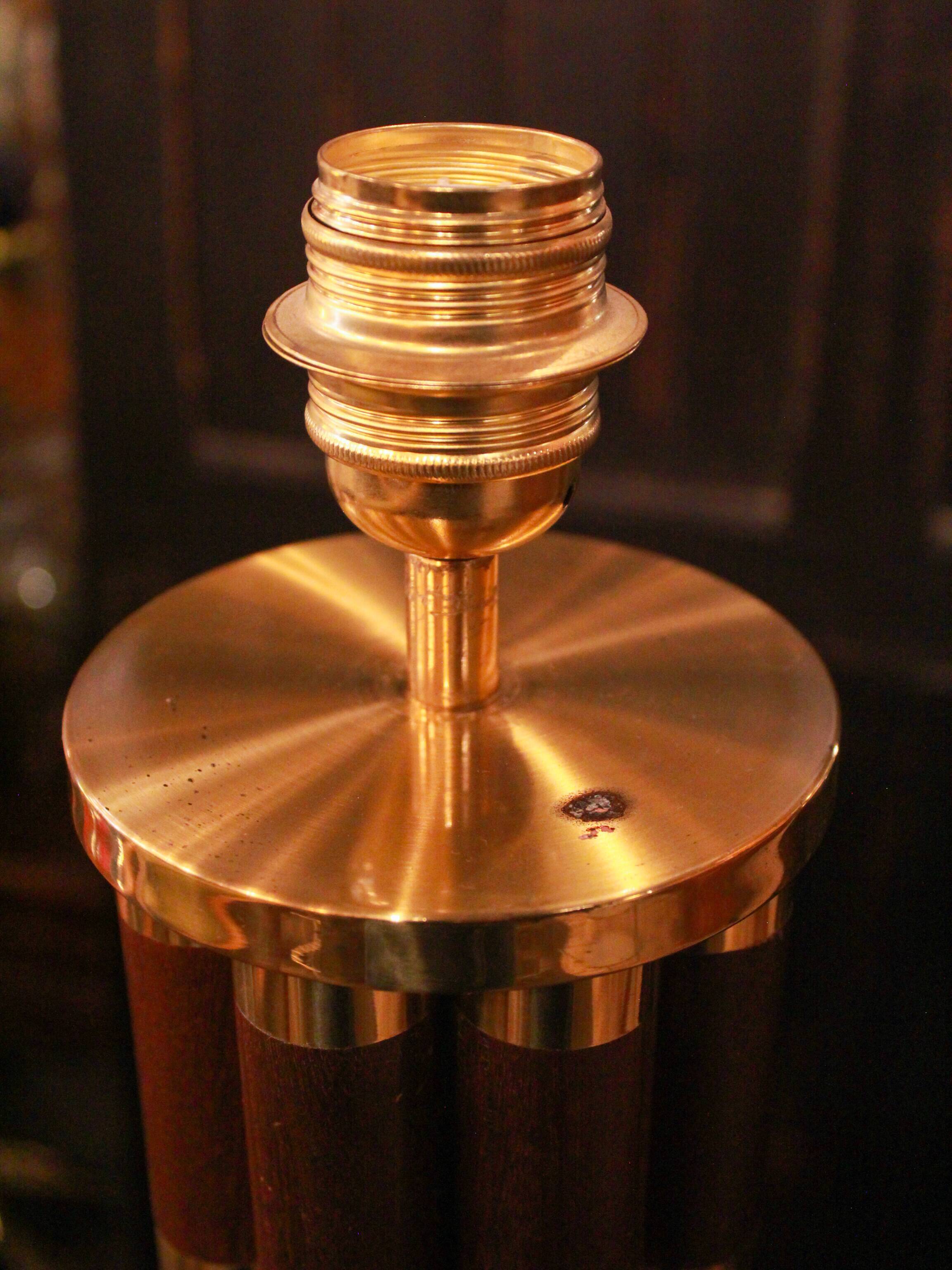 Pair of wooden and brass table lamps, French classic style.