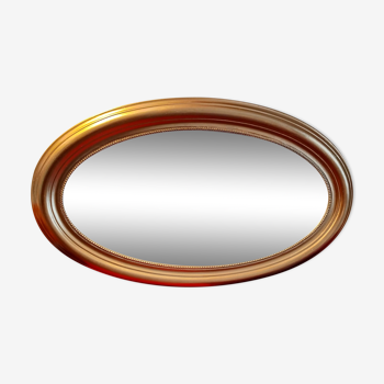 Miroir ovale doré biseauté, 95x59 cm
