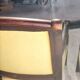 2 antique matching armchairs in wood and fabric