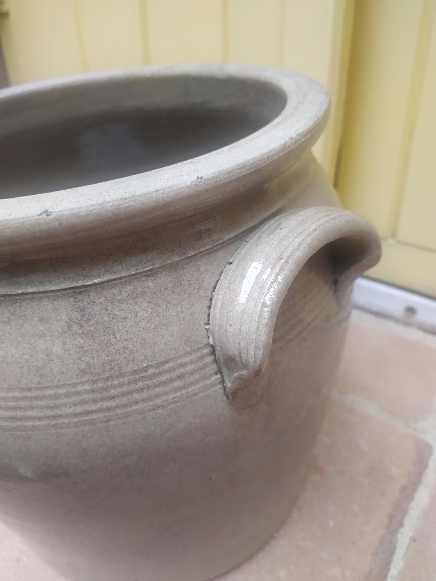 Old grease maker with two handles in gray glazed sandstone early 20th century