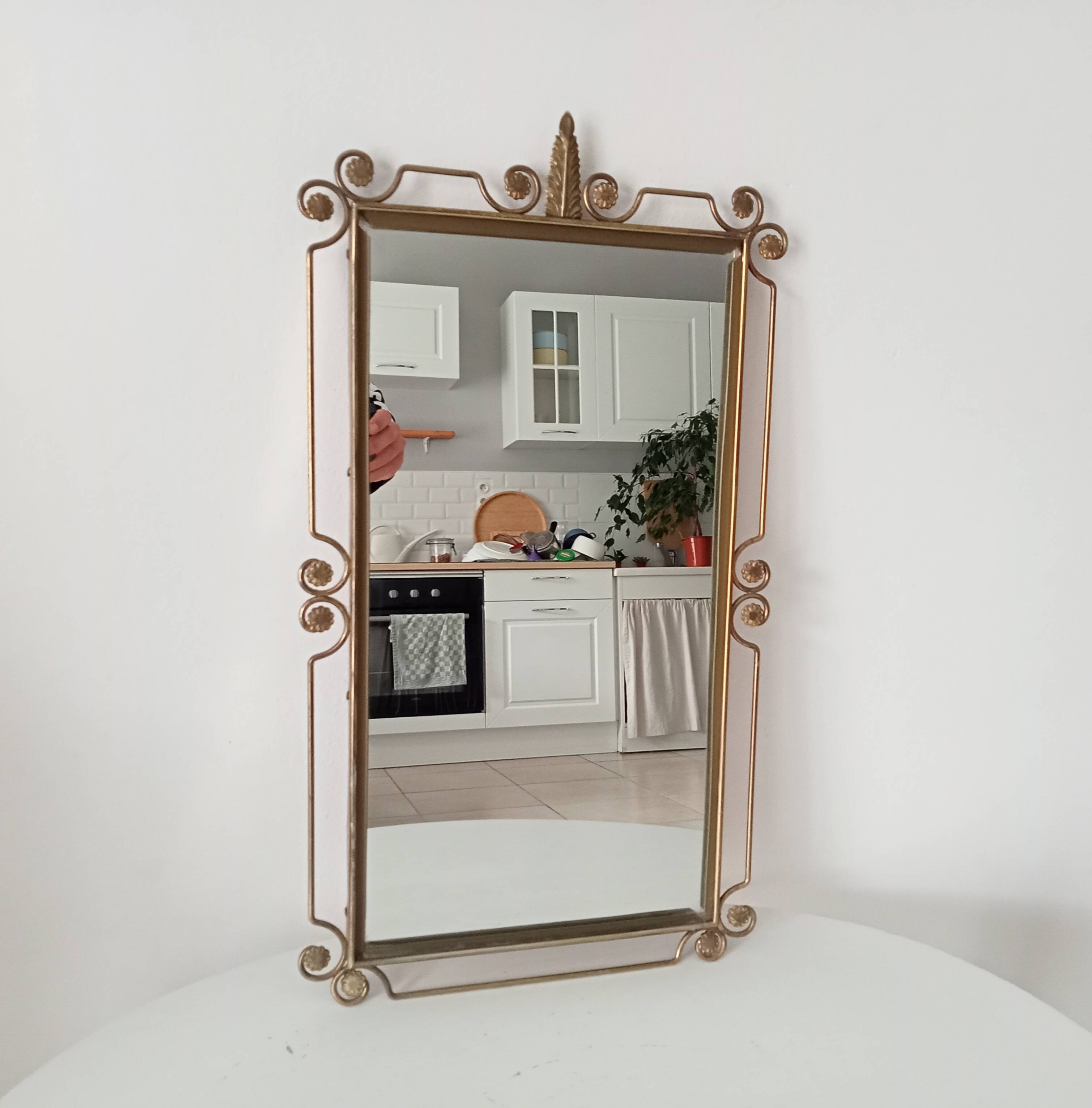 Vintage Hollywood Regency mirror from the 1950s.