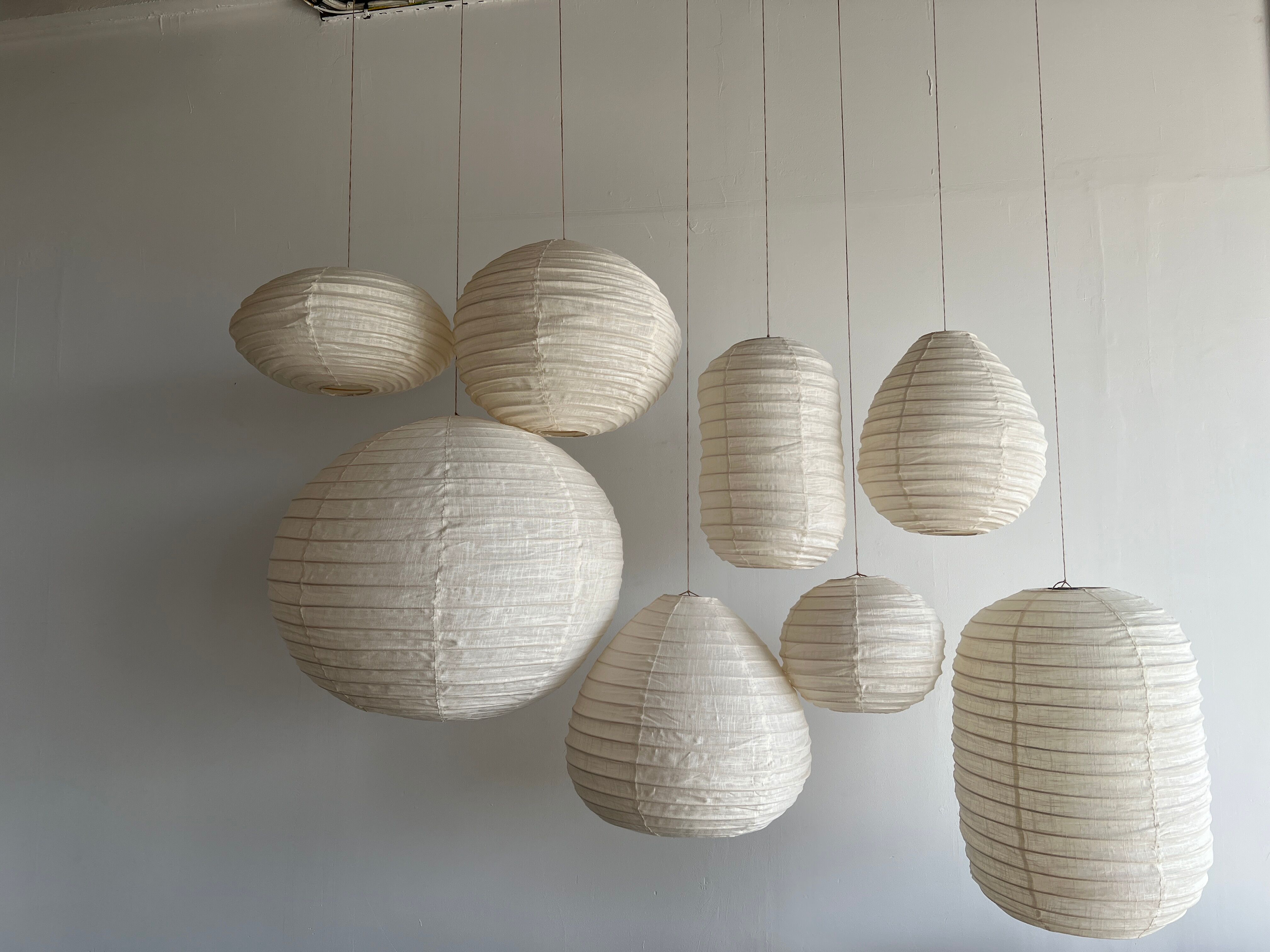 Suspension in rattan and natural japanese linen in the shape of a drop
