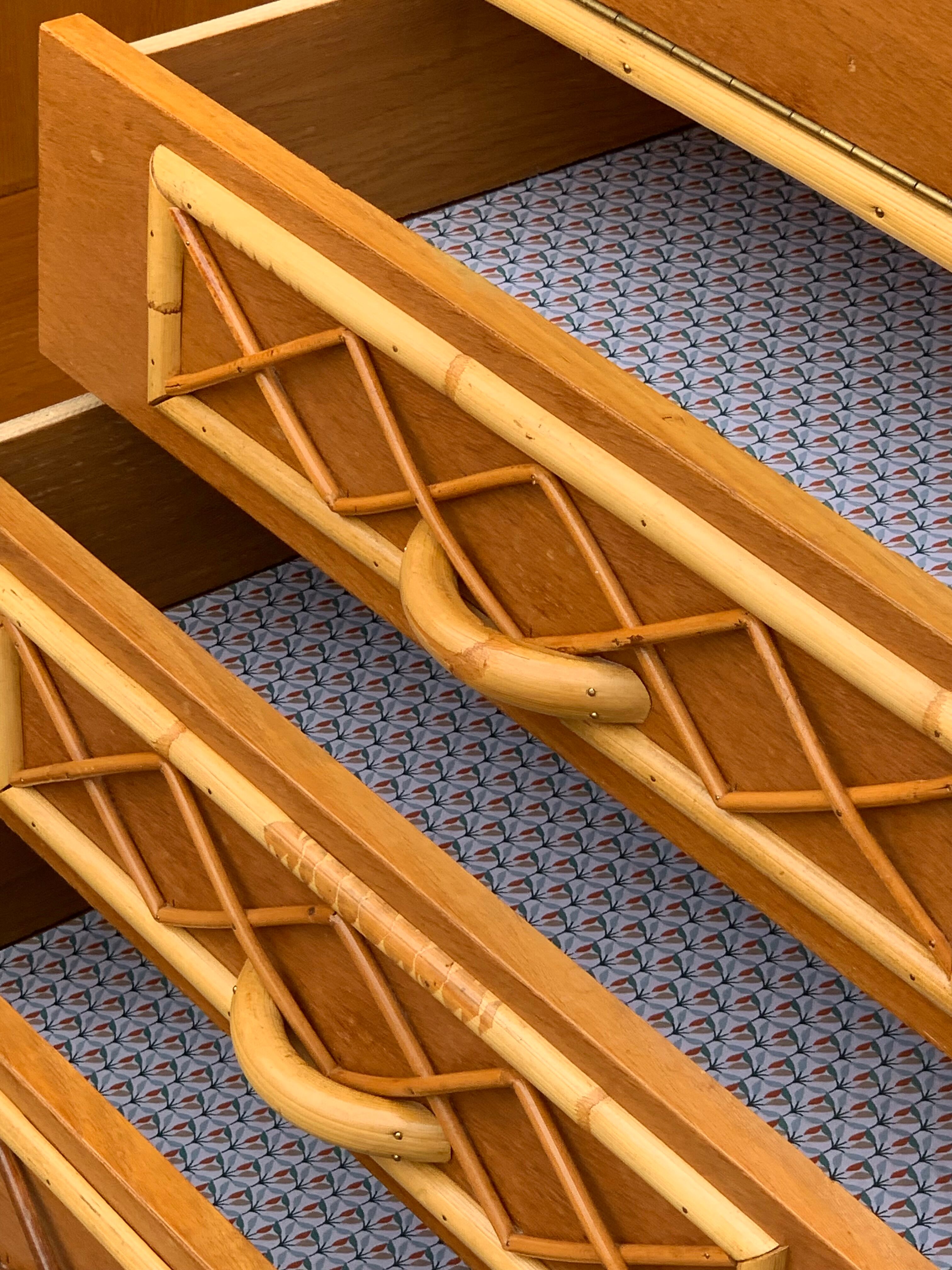 Rattan wardrobe with tapered legs from the 1960s.