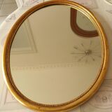 Oval gold mirror