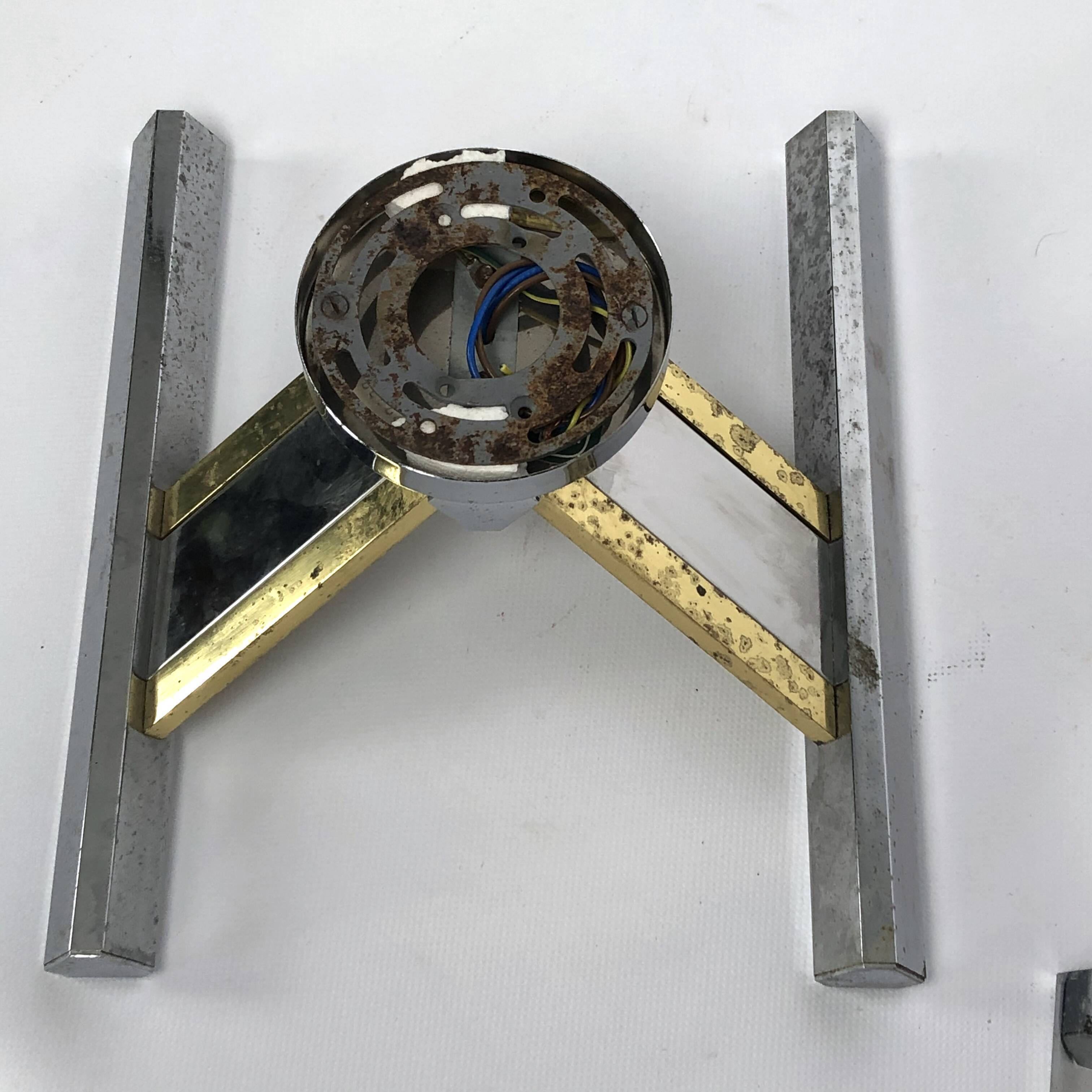 Pair of brass and chrome sconces from Sciolari 70