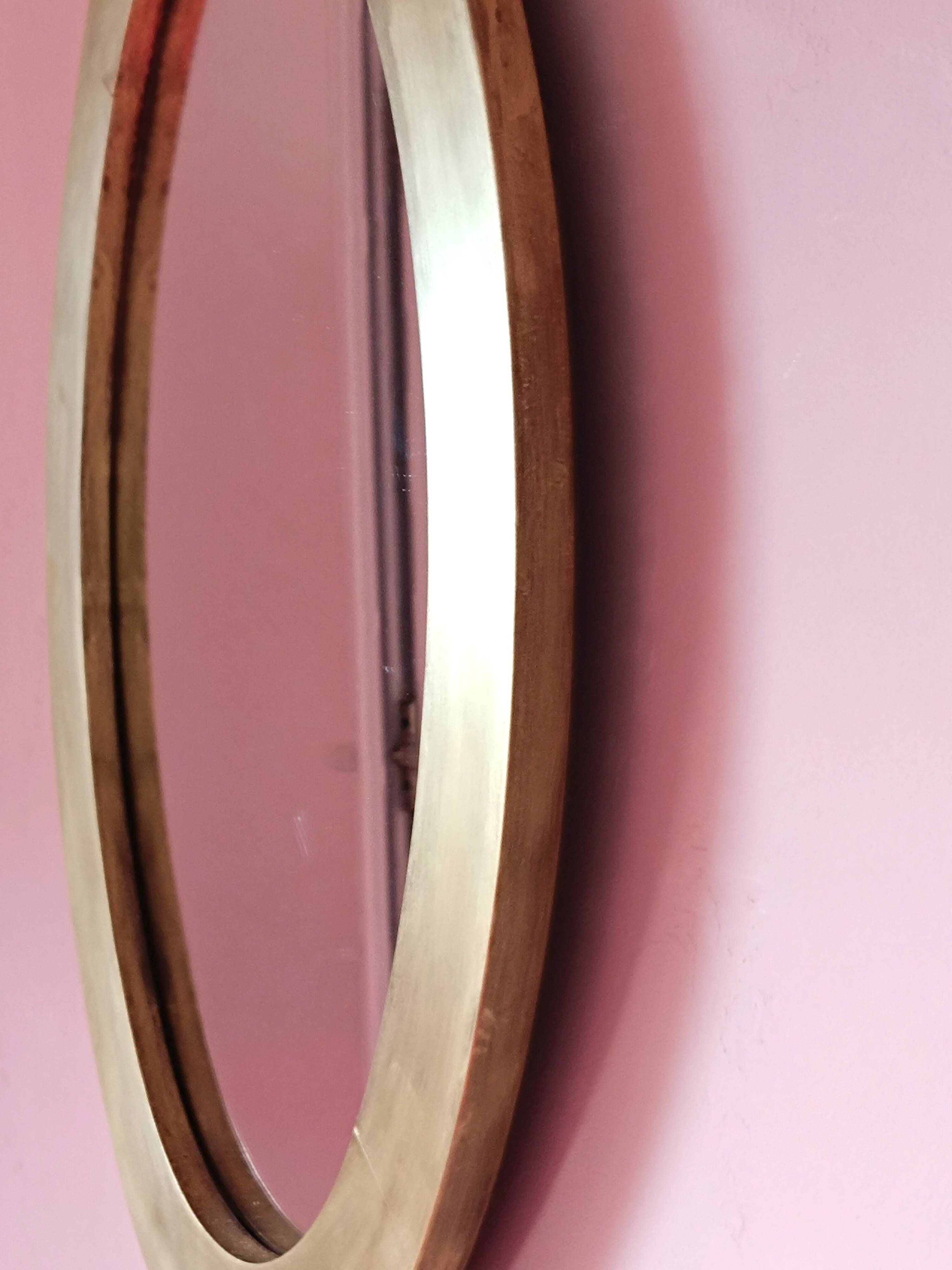 Miroir ovale en bois doré