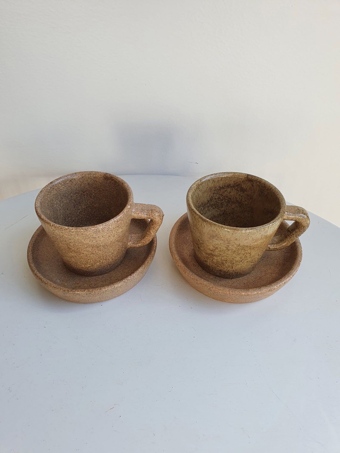 Lot of 2 cups and saucers in sandstone
