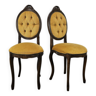 Pair of early 1900s wooden chairs with padded seat and backrests