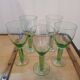 5 large green stemmed glasses