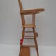 Chaise haute ancienne de poupée en bois clair décor papillon
