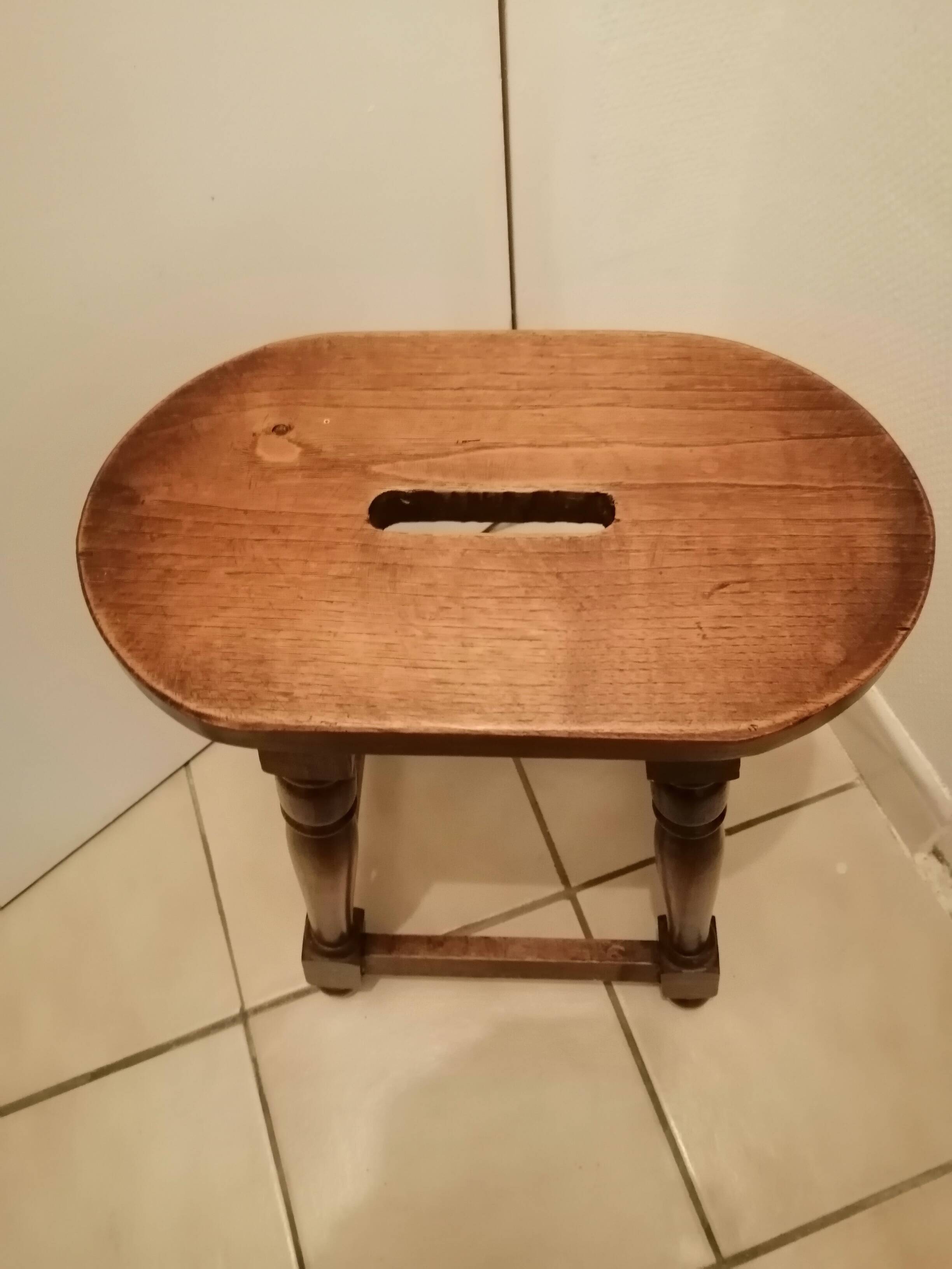 Antique rustic wooden stool
