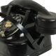 Old black telephone with rotary dial metal Bakelite RTT 56B