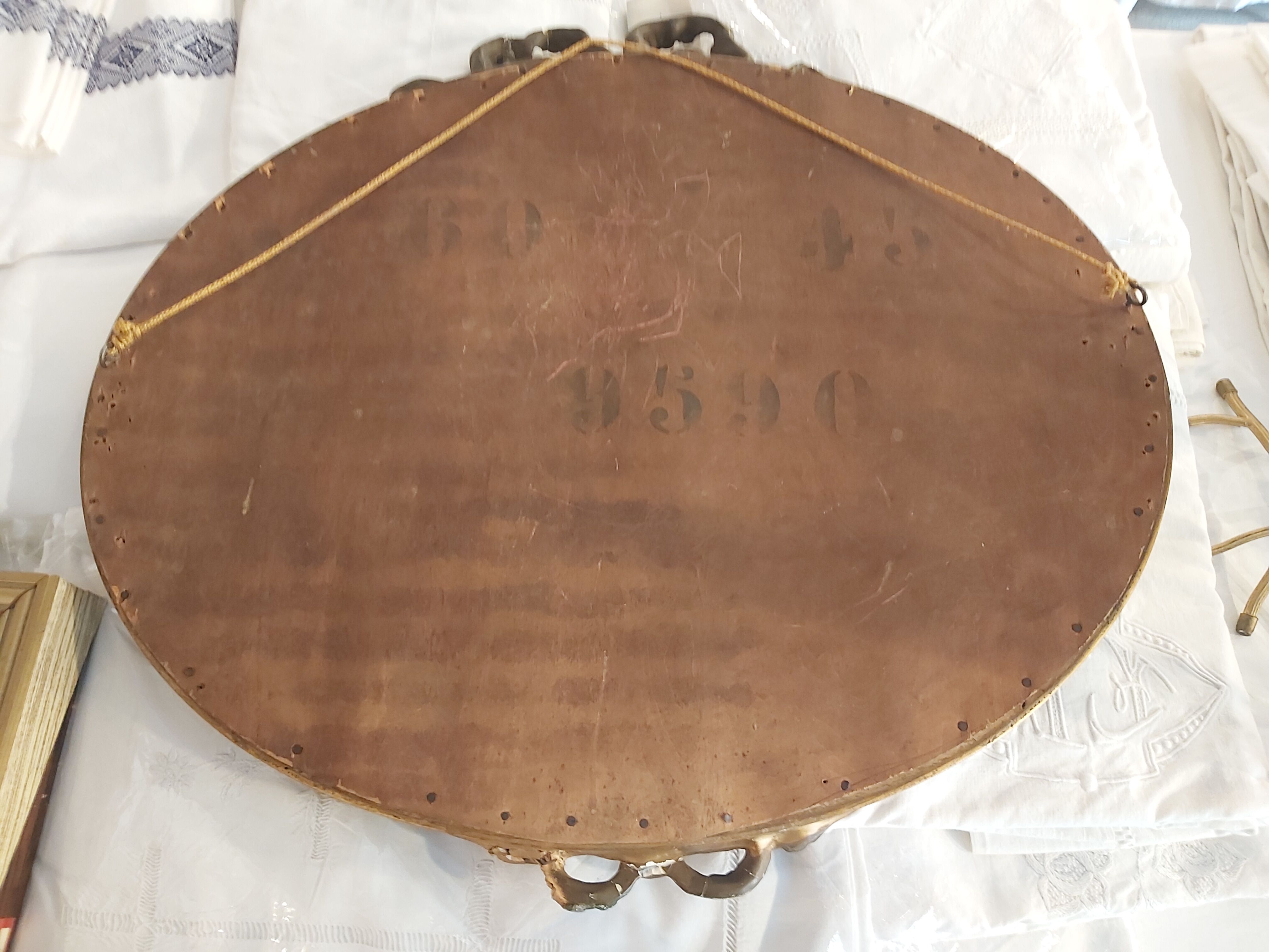 Louis XVI style oval beveled mirror