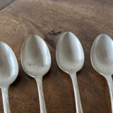 4 teaspoons in silver metal