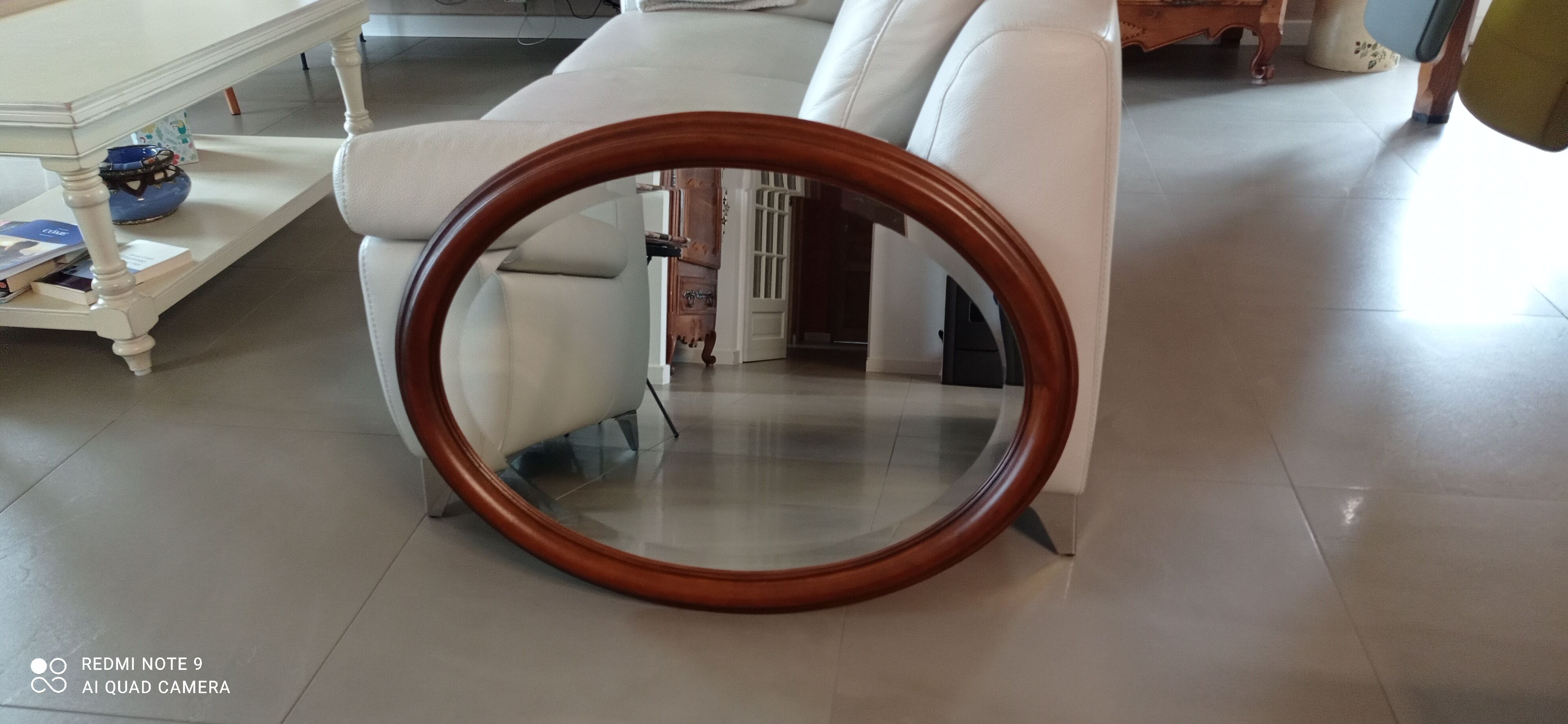 Old beveled oval mirror in excellent condition