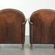 Characterful set of two sheepskin design armchairs with beautiful patina