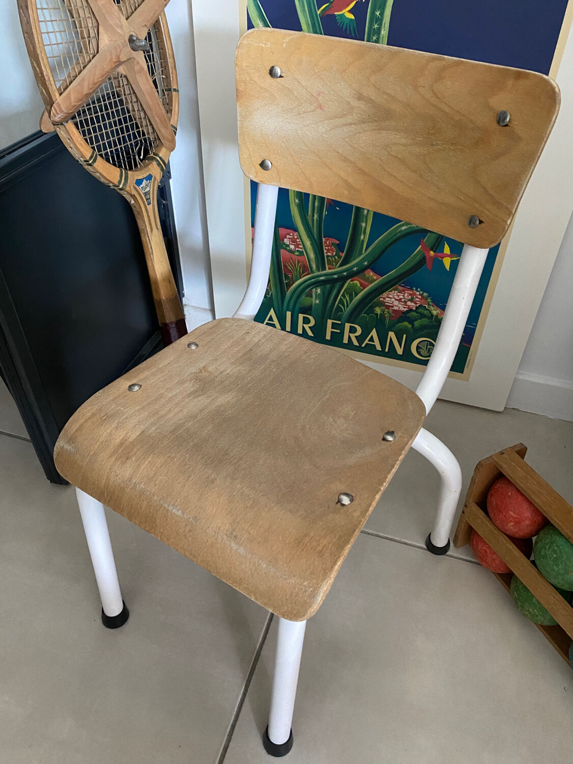 Old wooden and metal children's school chair
