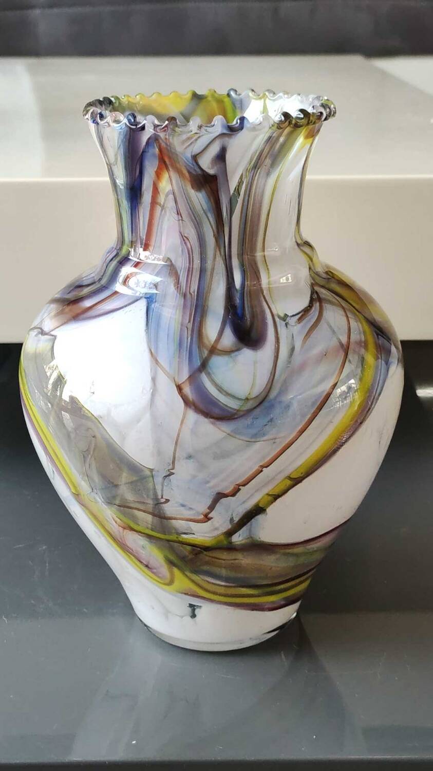 Blown Art glass ball vase from Murano/Italy. Decor swirls of smoke/polychrome waves. Dimensions 20 x 15 cm