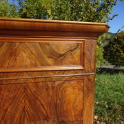 Walnut and walnut burl commode in Louis Philippe style.