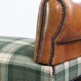 Antique daybed reupholstered with sheepskin and Scottish tartan wool