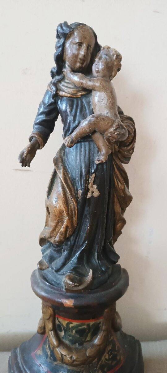 Ancient polychrome wooden sculpture representing the Virgin and Child, from