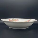 Round hollow Limoges dish with small yellow and purple flower patterns