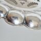 Silver scallop shell butter dish.