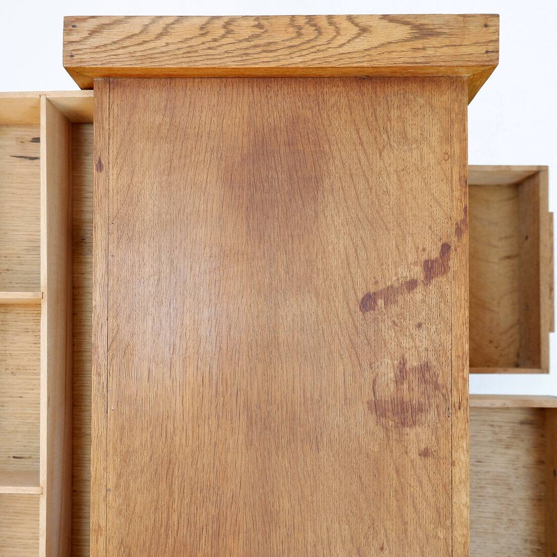 1960s wooden sewing cabinet with double-sided drawers