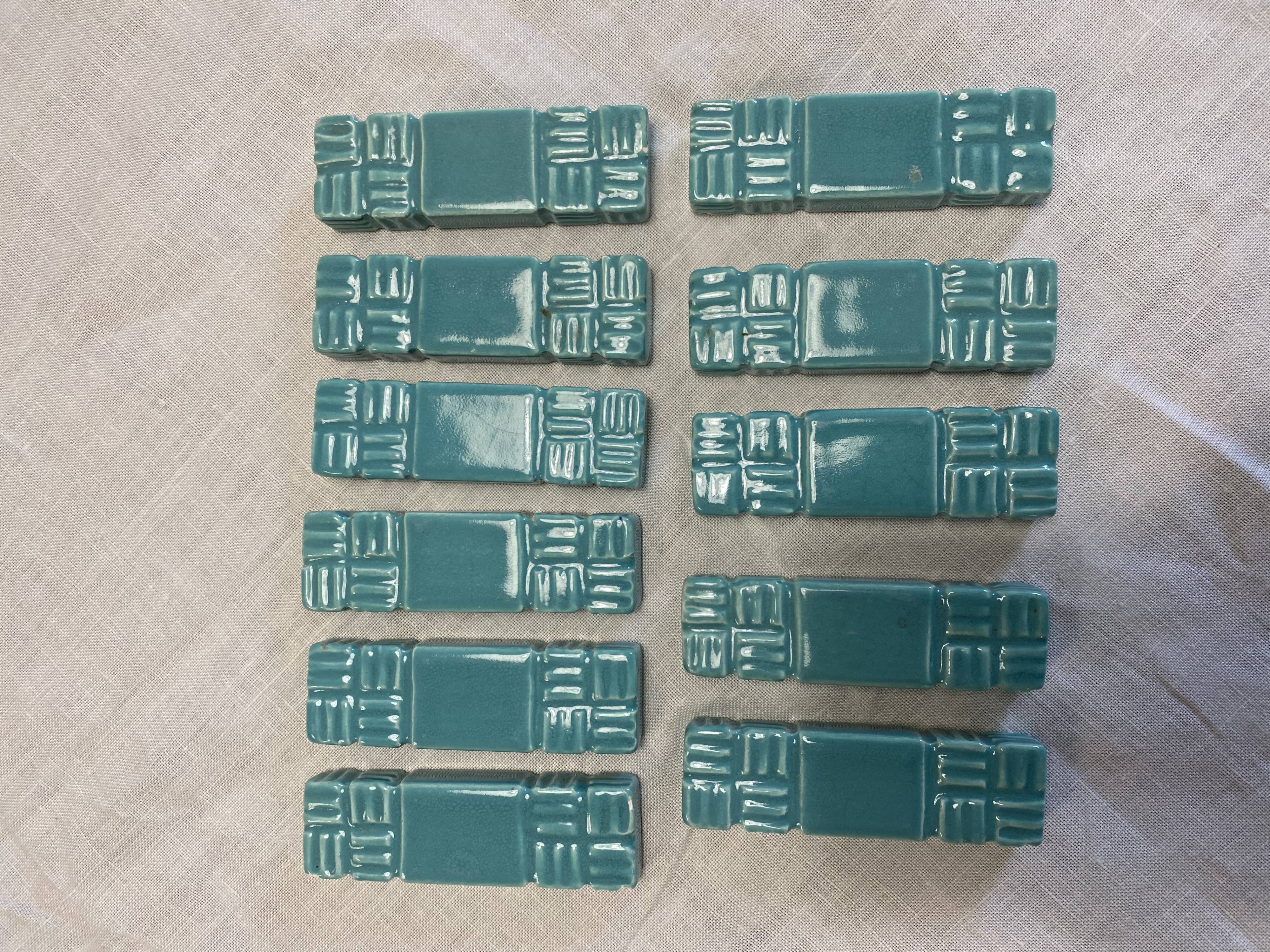 11 ceramic knife holders signed Jean Garillon