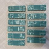 11 ceramic knife holders signed Jean Garillon