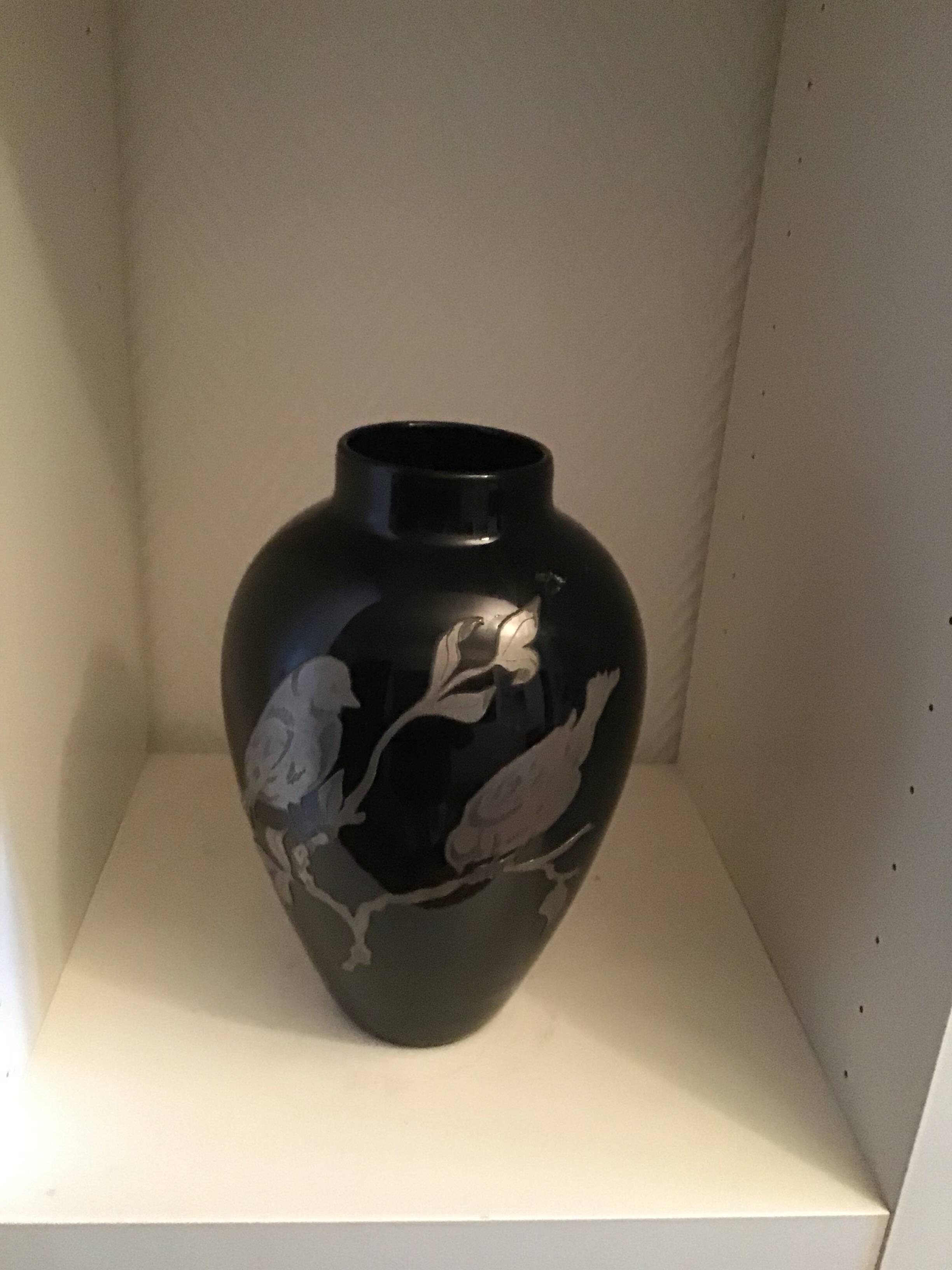 Black opaline vase with pewter branch and birds