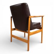 Fröscher leather armchair by Ib Kofod-Larsen, 1960