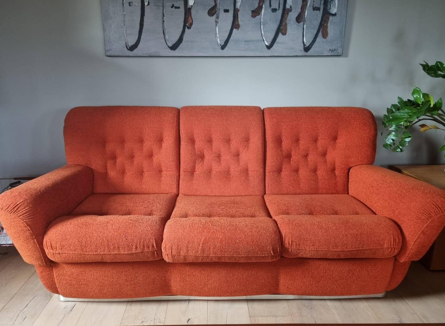 Set of seventies orange sofa and armchairs