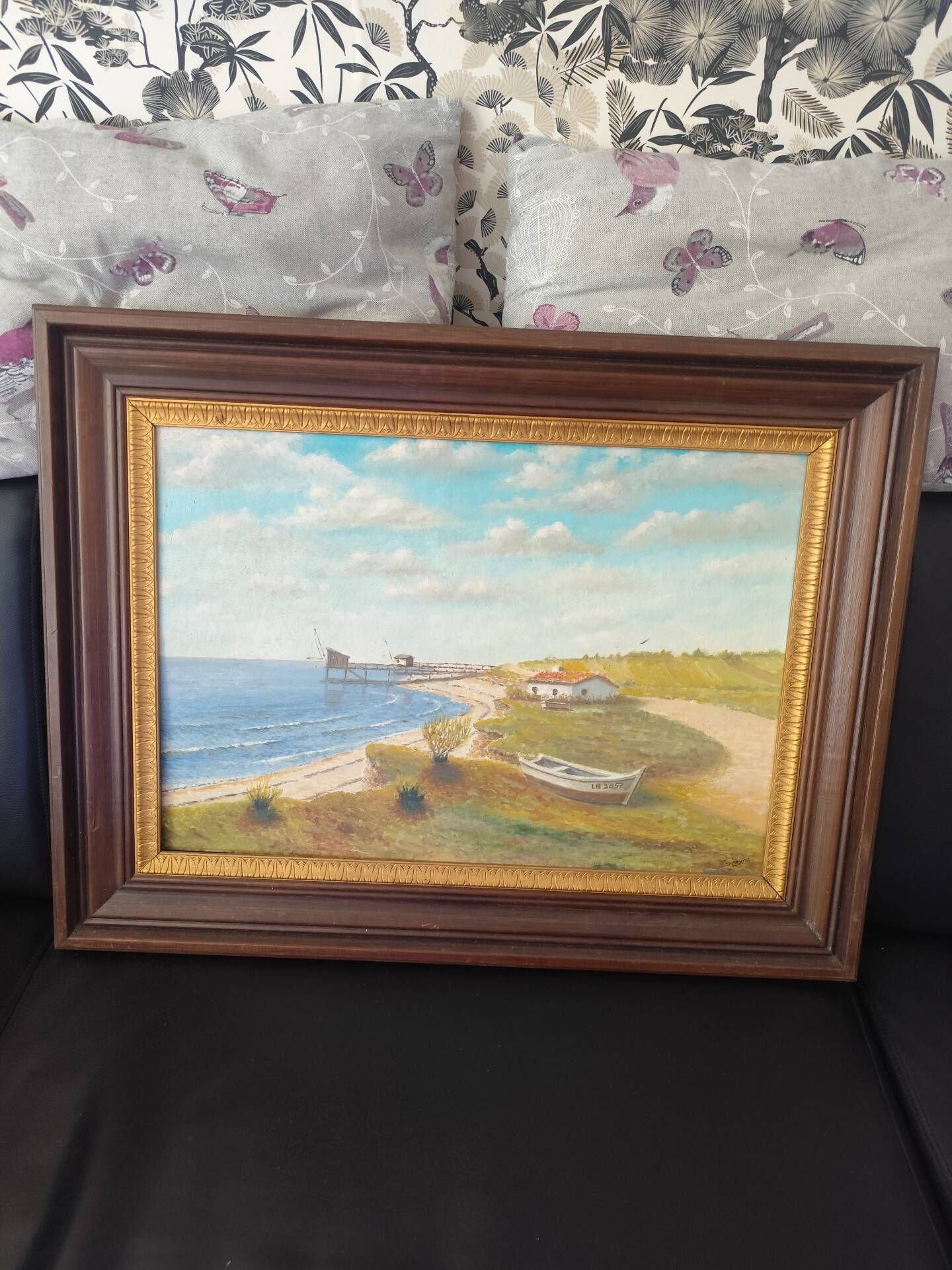 Beautiful painted picture depicting a seaside landscape.