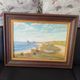 Beautiful painted picture depicting a seaside landscape.