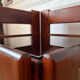 Modernist coffee table in wood and smoked glass.
