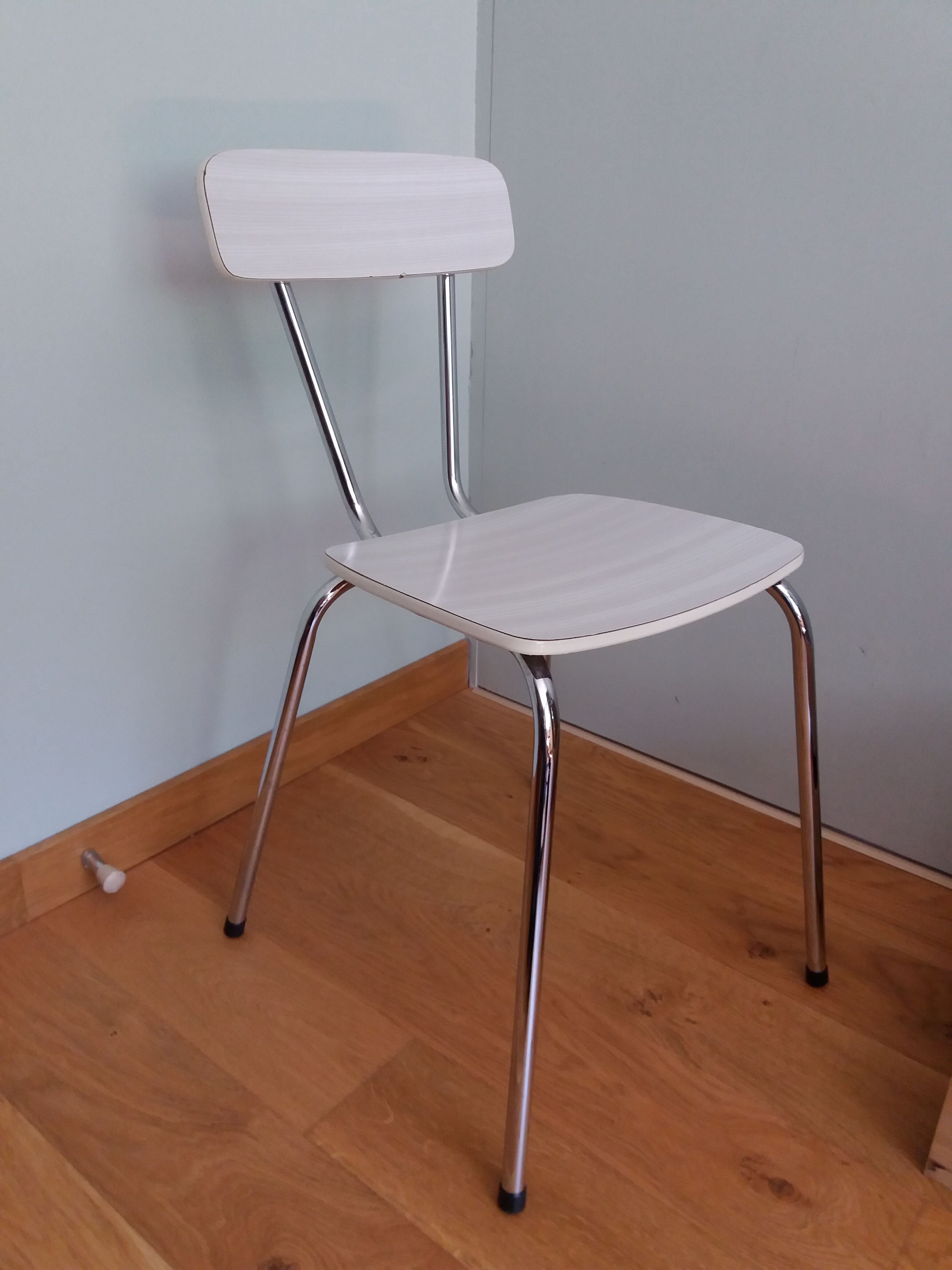Chrome metal chair and formica white striped gray