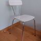 Chrome metal chair and formica white striped gray