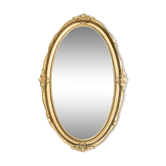 Miroir ovale dans un cadre doré