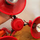 Three-lamp suspension in Memphis design style in red metal.