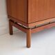 Modern mid-century teak sideboard with brass details.